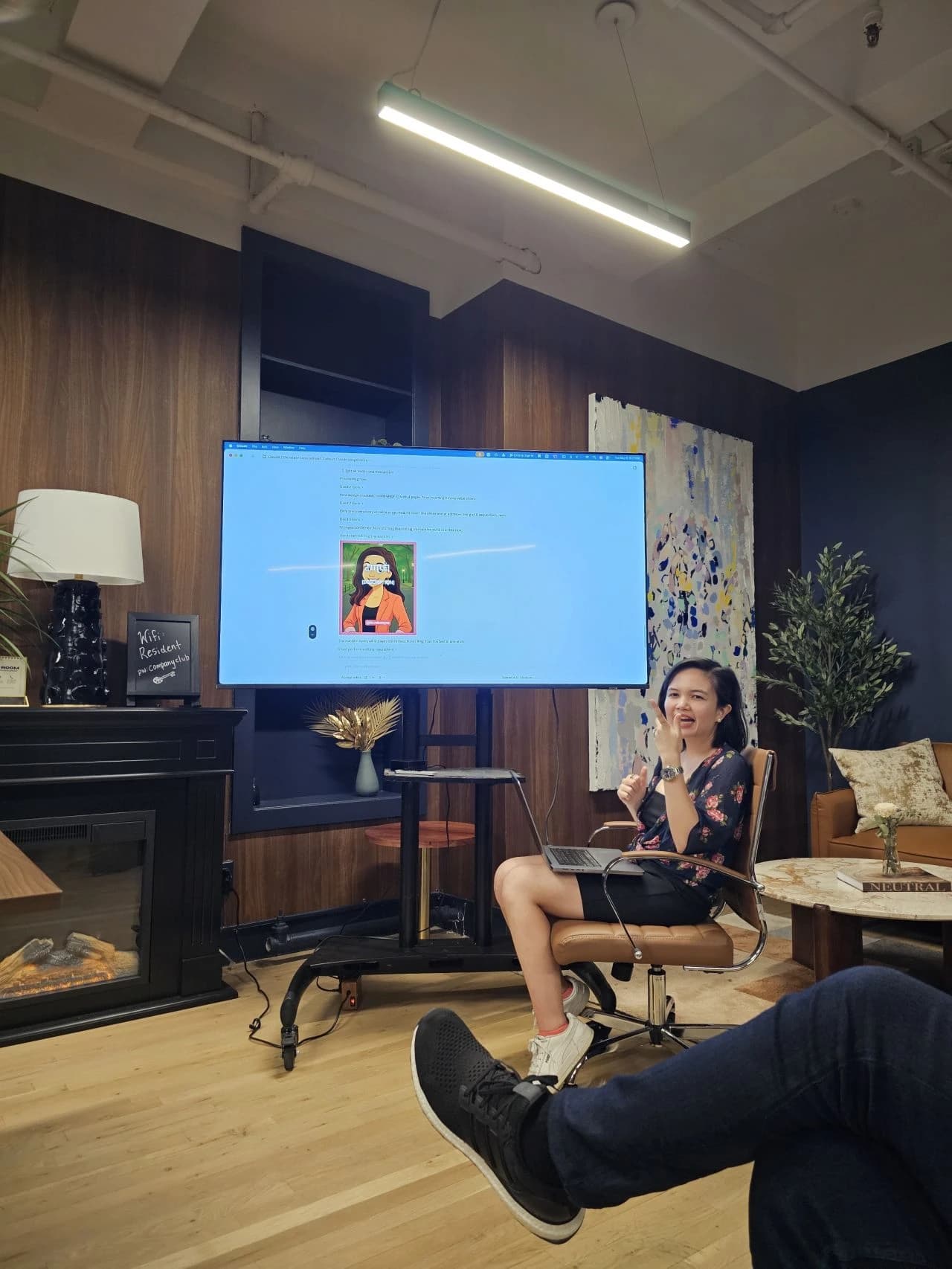 Mika walking a small group through a live AI demo