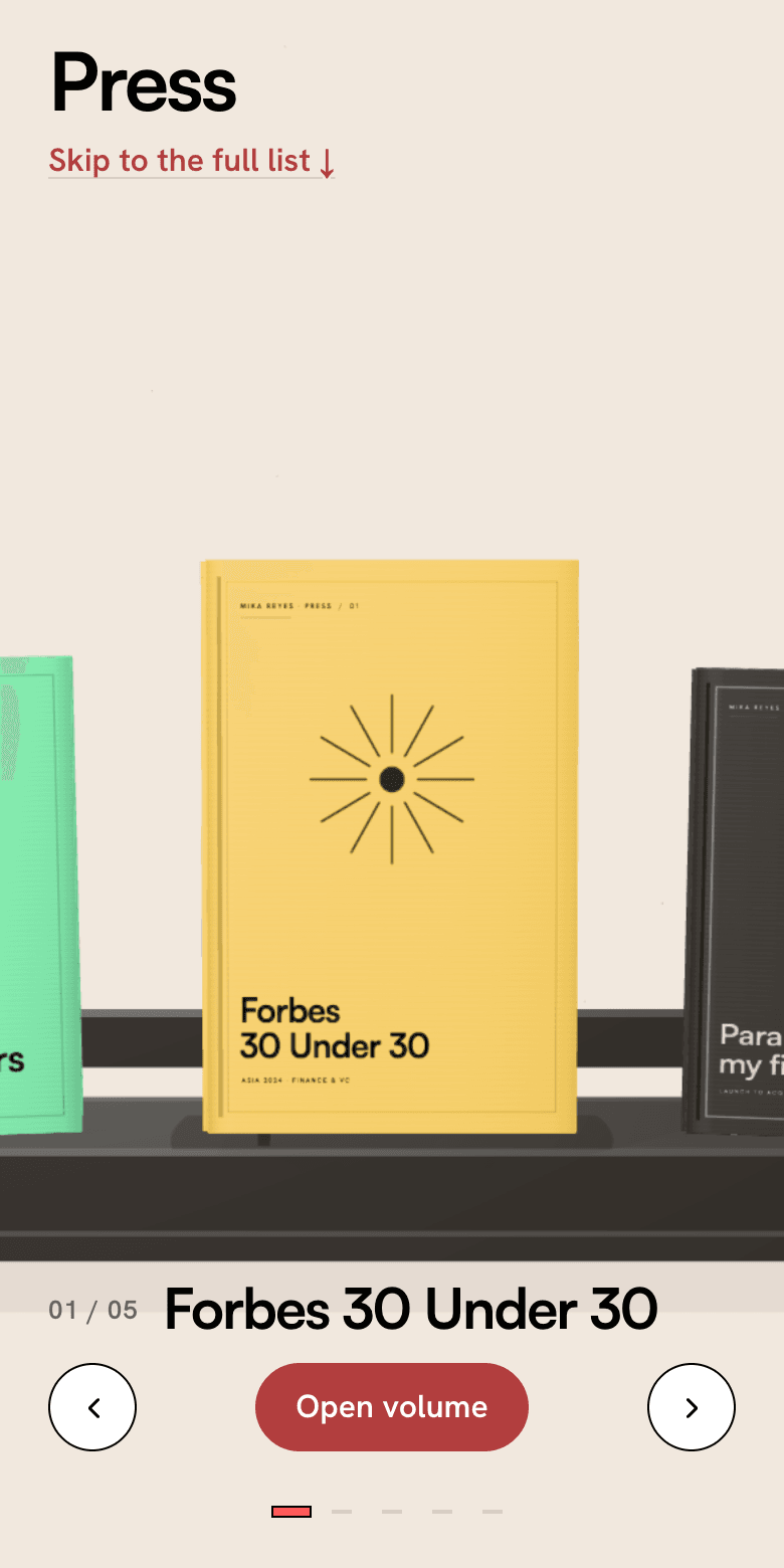 The 3D press shelf on a phone screen, showing the yellow Forbes 30 Under 30 book centered on the shelf with an Open volume button below